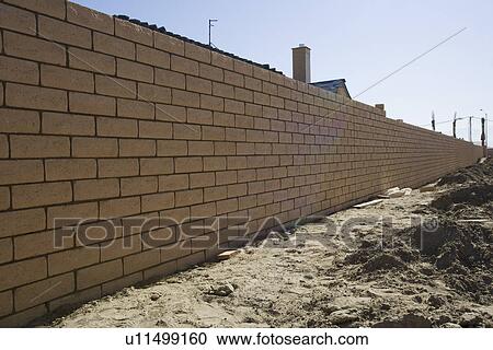 Stock Image - Unfinished brick wall. Fotosearch