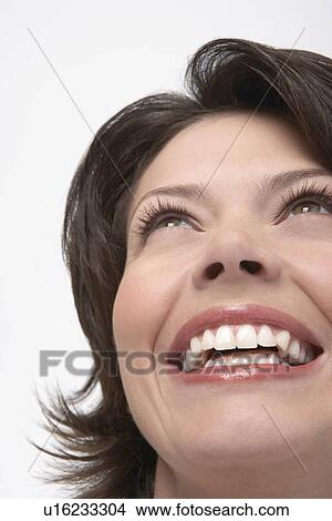 Picture - Woman with large smile, close-up. Fotosearch