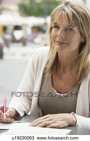 Woman Writing Postcards View Large Photo Image Stock Image - Woman Writing Postcards. Fotosearch