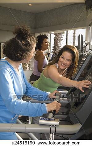 Women Working Out at Health Club View Large Photo Image Stock Image - Women Working Out at Health Club. Fotosearch