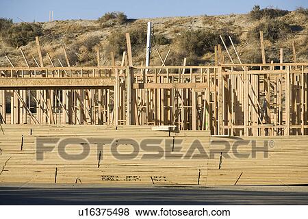 Stock Photo - Wooden beams on construction site. Fotosearch