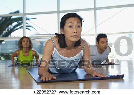Stock Photo - Yoga Class at Health Club. Fotosearch