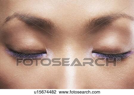 Young Asian woman's closed eyes View Large Photo Image Stock Image - Young Asian woman's closed eyes. Fotosearch