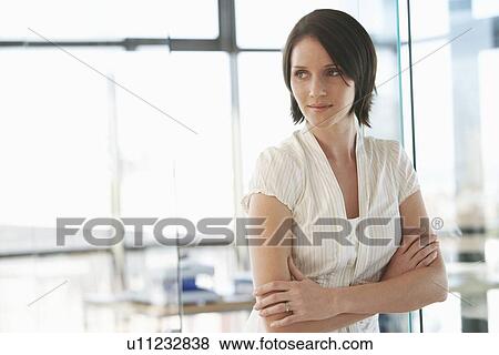 Young Businesswoman in Office View Large Photo Image Stock Photo - Young Businesswoman in Office. Fotosearch