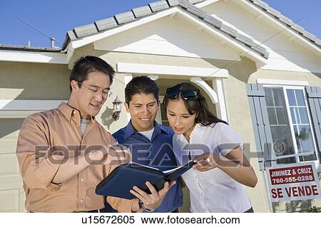Young couple buying house View Large Photo Image Stock Photography - Young couple buying house. Fotosearch