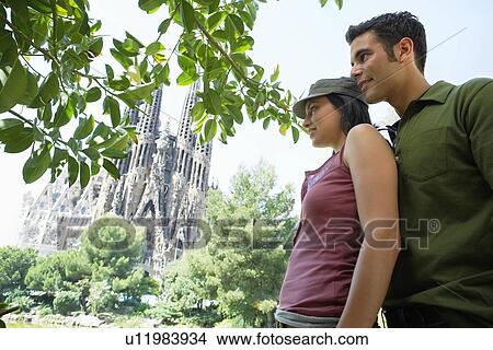 Young couple enjoying view in Barcelona, portrait View Large Photo Image Picture - Young couple enjoying view in Barcelona, portrait. Fotosearch