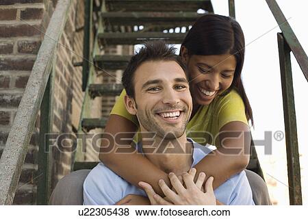 Young Couple on Fire Escape View Large Photo Image Stock Photo - Young Couple on Fire Escape. Fotosearch
