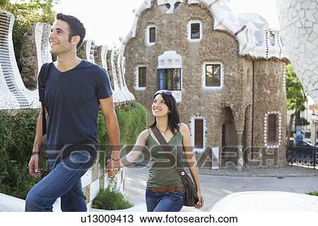 Stock Image - Young Couple Sightseeing. Fotosearch
