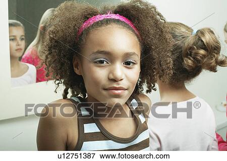 Young girl in bathroom with friends View Large Photo Image Stock Photo - Young girl in bathroom with friends. Fotosearch