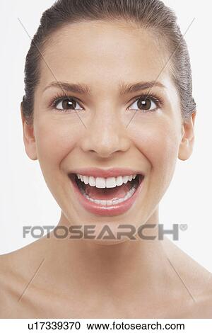 Young Woman smiling View Large Photo Image Stock Image - Young Woman smiling. Fotosearch