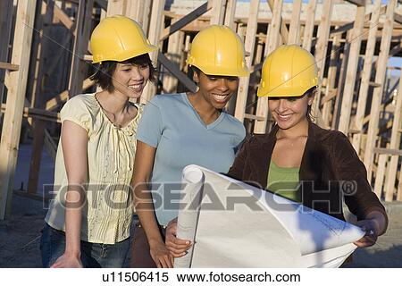 Young women in construction site View Large Photo Image Stock Photography - Young women in construction site. Fotosearch