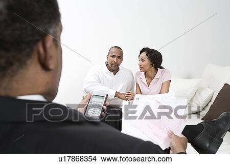 Picture - Accountant and Client Couple. Fotosearch