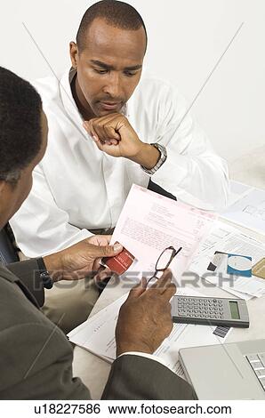 Stock Photograph - Accountant and Client. Fotosearch