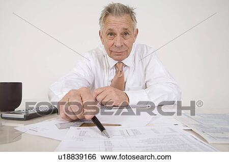 Accountant Pointing to Bottom Line View Large Photo Image Stock Photograph - Accountant Pointing to Bottom Line. Fotosearch