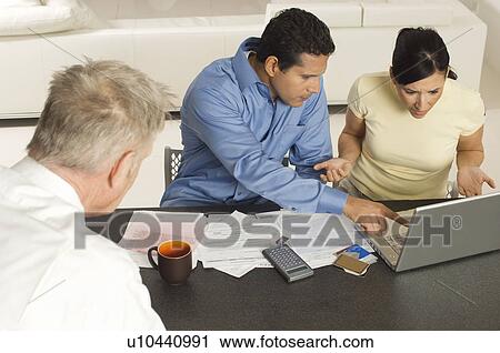 Accountant Working with Couple View Large Photo Image Stock Image - Accountant Working with Couple. Fotosearch