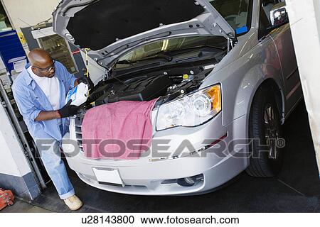 Auto Mechanic at Work View Large Photo Image Stock Image - Auto Mechanic at Work. Fotosearch