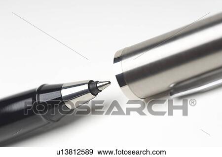 Stock Photo - Ballpoint pen on white background, close-up. Fotosearch
