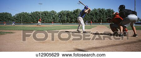 Baseball players on playing field View Large Photo Image Stock Photo - Baseball players on playing field. Fotosearch