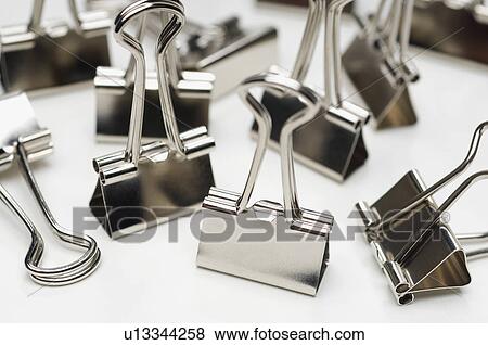 Stock Photo - Binder clip on white background. Fotosearch