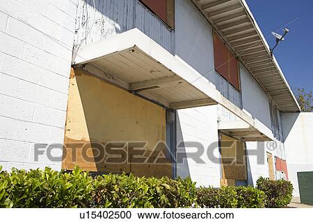 Stock Image - Boarded Up Apartments. Fotosearch
