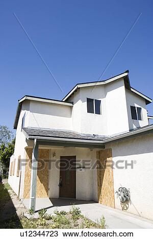 Stock Image - Boarded Up House. Fotosearch