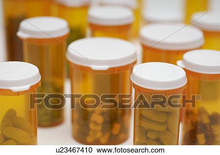 Bottles of pills, close-up View Large Photo Image Stock Image - Bottles of pills, close-up. Fotosearch