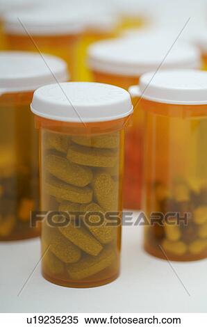 Bottles of pills, close-up View Large Photo Image Stock Photography - Bottles of pills, close-up. Fotosearch