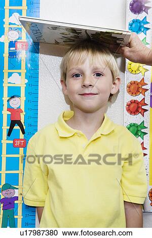 Boy Getting Height Measured View Large Photo Image Stock Image - Boy Getting Height Measured. Fotosearch