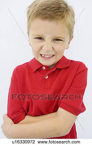 Stock Image - Boy Grimacing. Fotosearch
