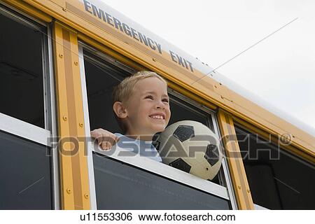 Stock Photograph - Boy on School Bus. Fotosearch