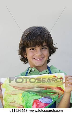 Stock Image - Boy Showing Off Painting. Fotosearch