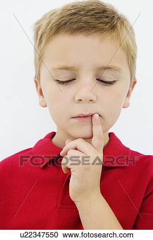 Stock Image - Boy Thinking. Fotosearch