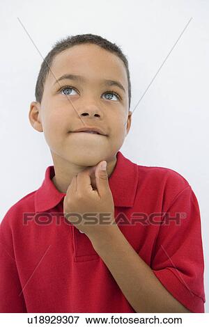Stock Photo - Boy Thinking. Fotosearch