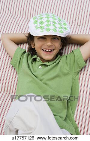 Stock Photograph - Boy Wearing Newsboy Cap. Fotosearch