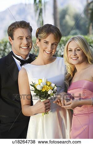 Bride, groom and bridesmaid, portrait View Large Photo Image Stock Photo - Bride, groom and bridesmaid, portrait. Fotosearch