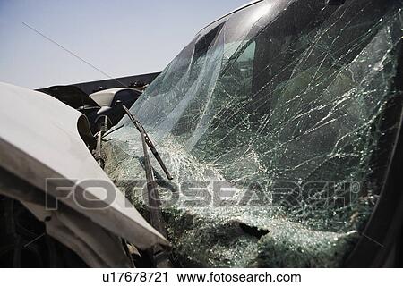 Stock Image - Broken car, close-up of windshield. Fotosearch