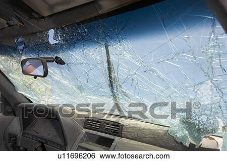Stock Photograph - Broken windshield of car, view from interior. Fotosearch