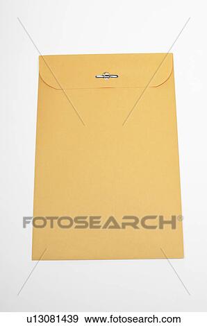 Stock Photo - Brown envelope on white background. Fotosearch
