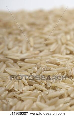 Brown rice, close-up View Large Photo Image Stock Photo - Brown rice, close-up. Fotosearch