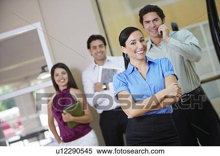 Stock Photography - Business colleagues in office, portrait. Fotosearch