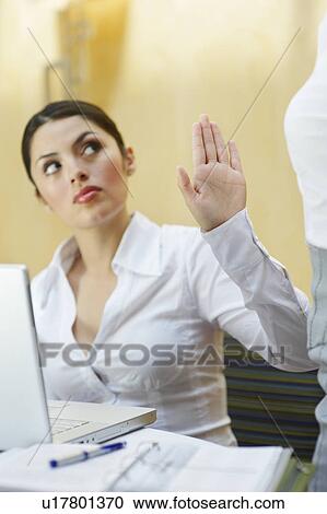 Business woman using laptop in office View Large Photo Image Stock Image - Business woman using laptop in office. Fotosearch