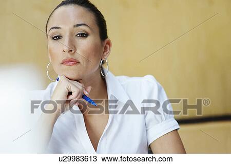 Business woman using laptop in office View Large Photo Image Stock Image - Business woman using laptop in office. Fotosearch