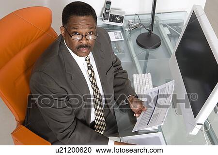 Businessman at His Desk View Large Photo Image Stock Image - Businessman at His Desk. Fotosearch