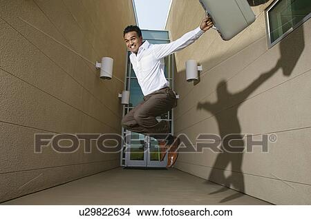 Picture - Businessman Jumping. Fotosearch