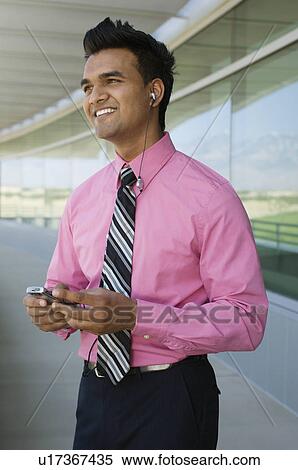 Stock Photography - Businessman Talking on a Cell Phone. Fotosearch