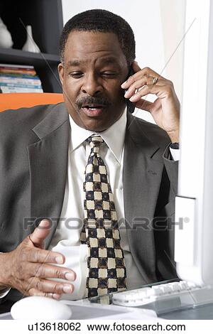 Businessman Talking on Cell Phone View Large Photo Image Stock Image - Businessman Talking on Cell Phone. Fotosearch