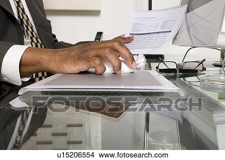 Picture - Businessman Using a Computer. Fotosearch