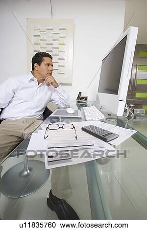 Businessman Working at Desk View Large Photo Image Stock Image - Businessman Working at Desk. Fotosearch