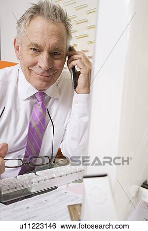 Businessman Working at Desk View Large Photo Image Stock Photograph - Businessman Working at Desk. Fotosearch