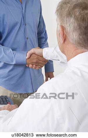Businessmen Shaking Hands View Large Photo Image Stock Image - Businessmen Shaking Hands. Fotosearch